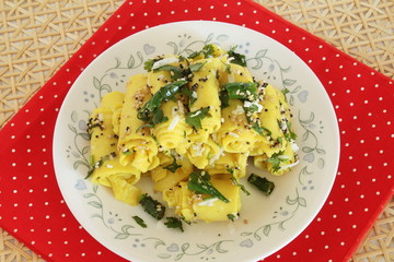 traditional Indian gujarati food Snack Khandvi made from Gram Flour or chickpea flour