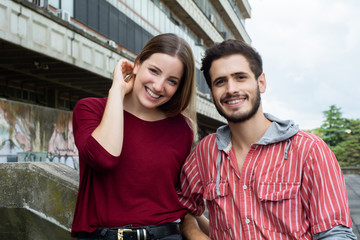 Naklejka premium Two University students studying together outdoors