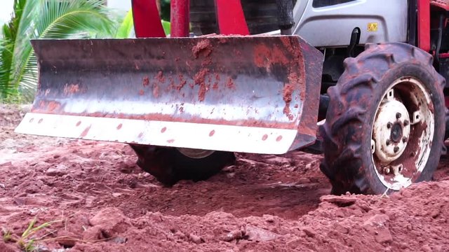 The concept, Labor Day: The man is working over labor by driving the bulldozer footage slow motion