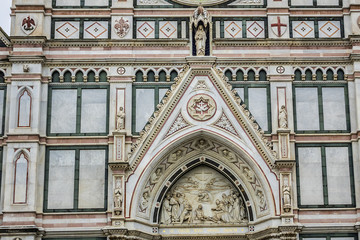 Architectural fragments of Florence Basilica of Holy Cross (Basilica di Santa Croce, 1385) - Franciscan church on Piazza di Santa Croce - largest Franciscan church in world. Florence, Tuscany, Italy.