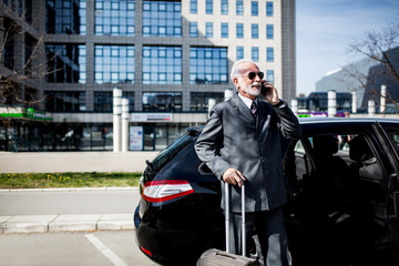 Senior business man ready for trip