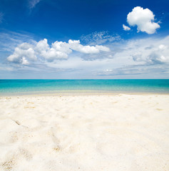tropical Maldives island with white sandy beach and sea