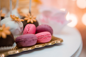 candy bar in pink, photo zone in pink for the girl's birthday, cake for the birthday girl with the inscription 