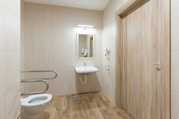 Fototapeta na wymiar Interior of a bathroom for handicapped people