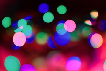Obraz premium Abstract background of neon lights. The lights are out of focus.