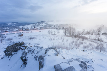 Winter basalt formation Panska skala, close Kamenicky Senov in Czech Republic.