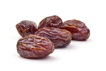 Fresh Medjool dry Dates, close-up, isolated on white background