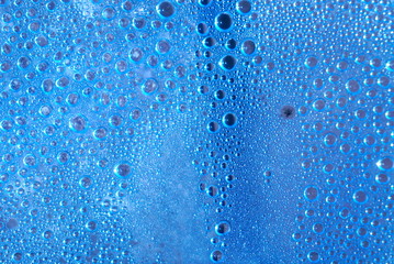 Naklejka na ściany i meble bubbles on a blue background