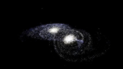 A pair of similar galaxies colliding and merge.