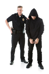 Police: Male Officer Stands Next To Handcuffed Criminal