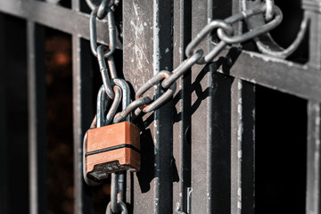 Gate to the lock with a chain