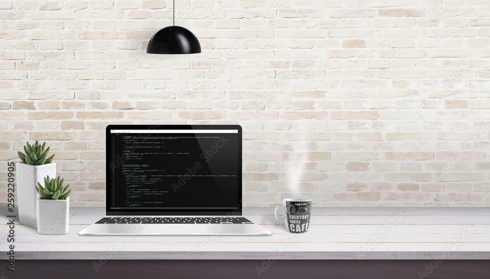 Poster Development studio concept. Laptop with script code. Free space for text beside.
