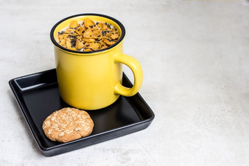 cup of coffee and cookies on marble desk