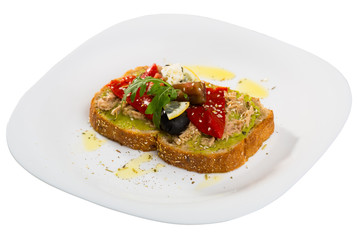 Sandwiches with guacamole, canned fish, pepper, feta