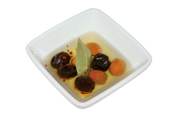 olives in olive oil in dish