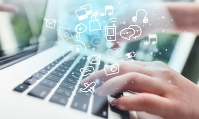 Woman typing computer.