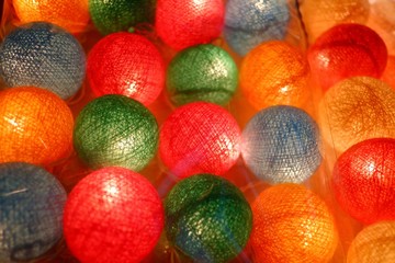 Colorful of many light balls on the ground floor and glowing in the dark night for background texture 