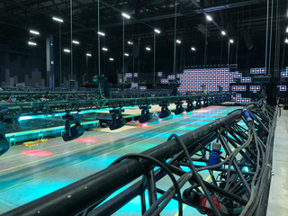 Installation of professional sound, light, video and stage equipment for a concert. Stage lighting...
