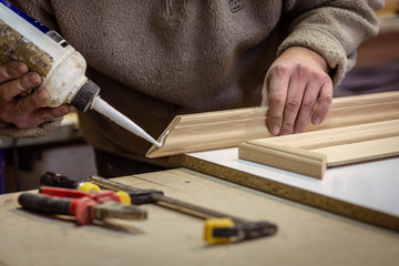 Making furniture from wood. Work carpenter. Carpentry tools.