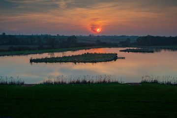 Fireball Over Water / An image of a fireball in the sky captured over a lake in Leicestershire, England, UK
