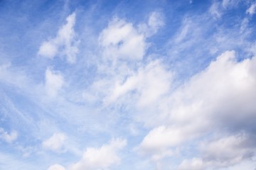 Naklejka na ściany i meble Beautiful blue sky with cirrocumulus white clouds. Soft and gentle.