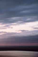 Fototapeta premium dramatic sky and clouds at the lake