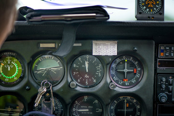 Detail of old airplane cockpit. Aircraft equipment, various indicators, buttons, instruments. The flight desk and control panel during take off and landing.