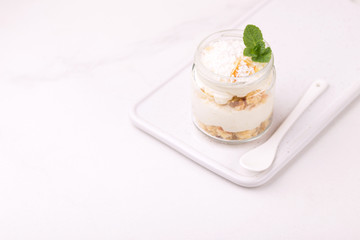 Coconut bisquit dessert with ricotta, mint. Yogurt breakfast