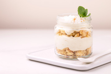 Coconut bisquit dessert with ricotta, mint. Yogurt breakfast