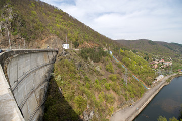 Fototapeta na wymiar River at hydroelectric dam in Romania, Cluj Napoca.