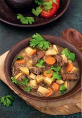 Beef and potato stew with carrots. Rustic style