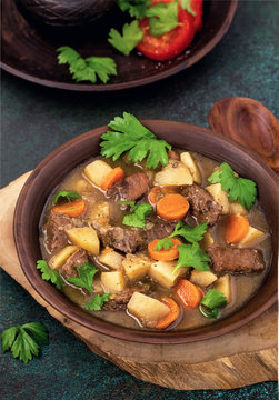 Beef and potato stew with carrots. Rustic style