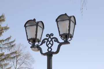 street lamp on blue sky background