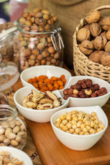 Various piles of mixed nuts and seeds