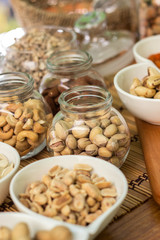 Various piles of mixed nuts and seeds