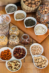 Various piles of mixed nuts and seeds