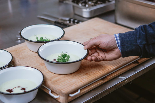 Parsley soup with red beet sauce