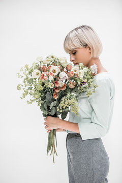woman holding a boquet