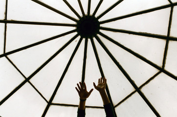 Hands reaching to the center