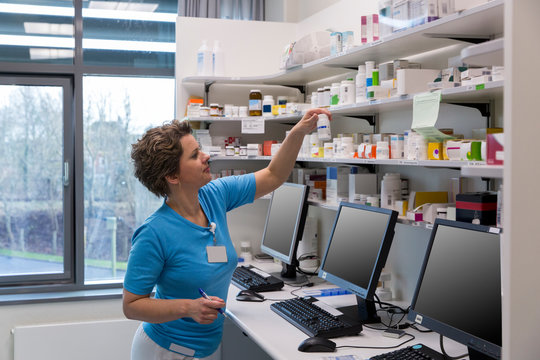 A nurse in a medication room