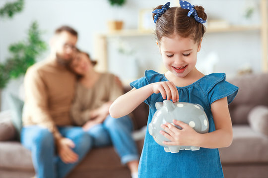 family savings, budget planning, children's pocket money. family with piggy Bank