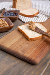 Peanut Butter, Grape Jelly, Loaf Bread Gathered to Make Sandwiches