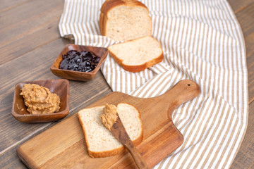 Peanut Butter, Grape Jelly, Loaf Bread Gathered to Make Sandwiches