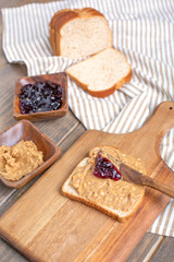 Peanut Butter, Grape Jelly, Loaf Bread Gathered to Make Sandwiches