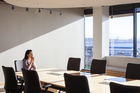 Female executive at conference table