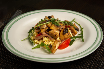 Tuna meat and pasta salad with vegetables and tomato sauce