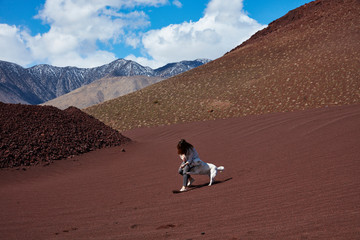 Woman and dog in the Desert
