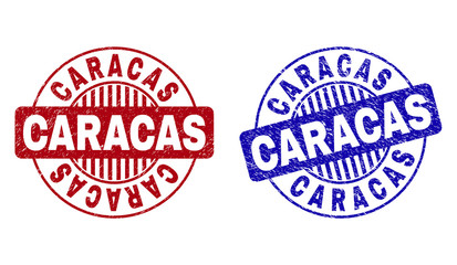 Grunge CARACAS round stamp seals isolated on a white background. Round seals with grunge texture in red and blue colors. Vector rubber imitation of CARACAS text inside circle form with stripes.