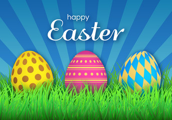 Colorful Easter eggs on green grass