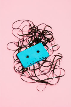 Blue cassette with messy tape